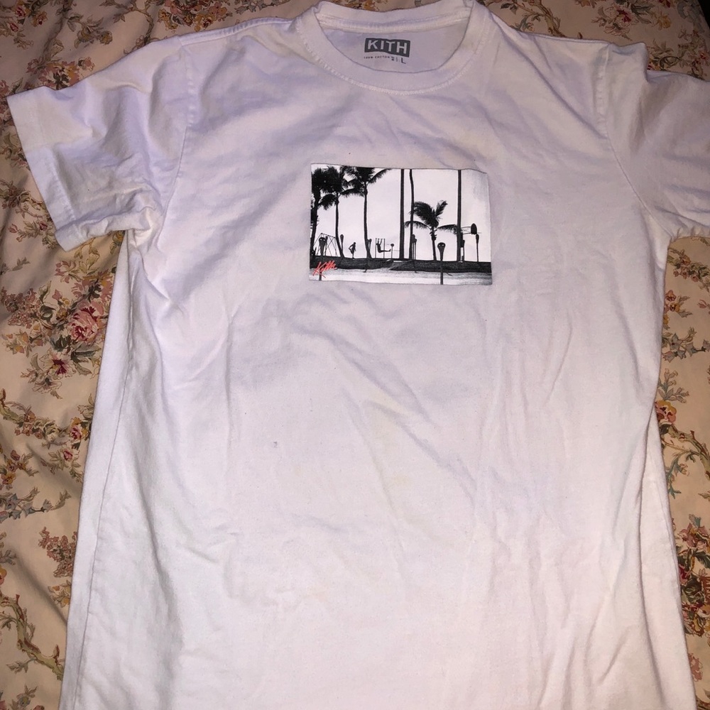 White Kith shirt.